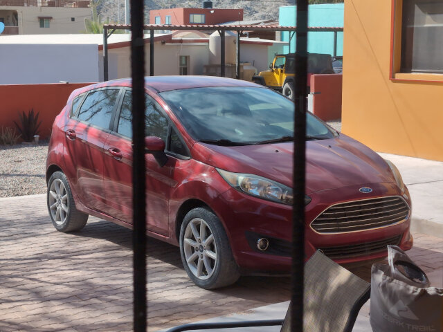 A car through a window.